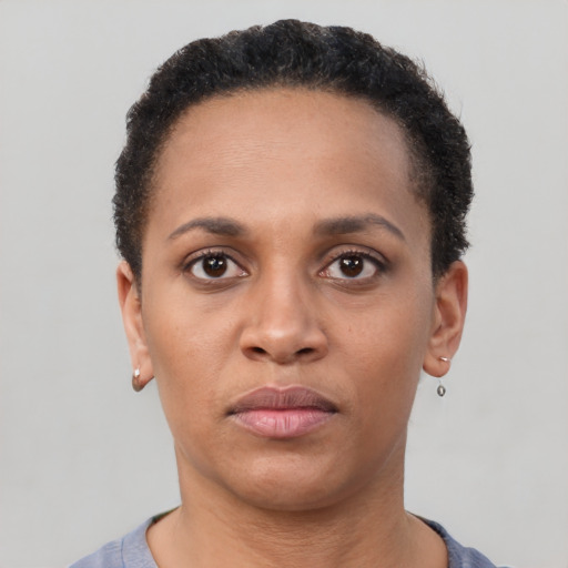 Neutral black young-adult female with short  brown hair and brown eyes