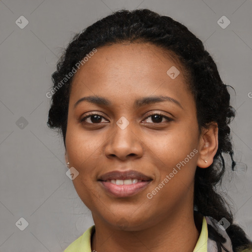 Joyful black young-adult female with medium  black hair and brown eyes