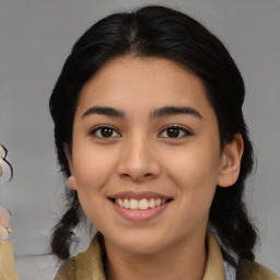 Joyful asian young-adult female with medium  black hair and brown eyes