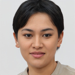 Joyful asian young-adult female with short  black hair and brown eyes