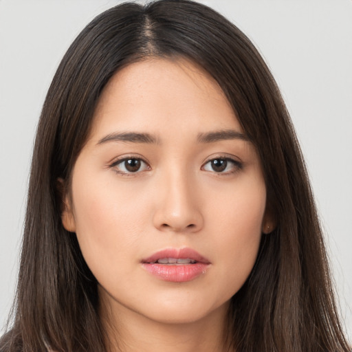 Neutral asian young-adult female with long  brown hair and brown eyes