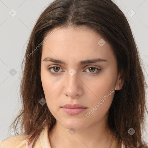 Neutral white young-adult female with long  brown hair and brown eyes