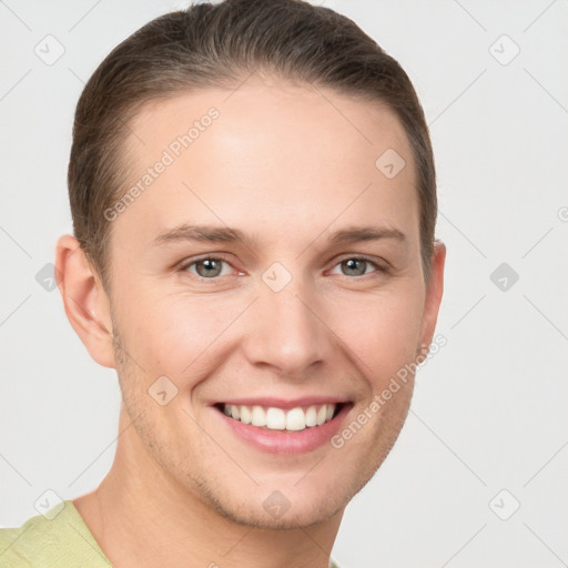 Joyful white young-adult female with short  brown hair and grey eyes