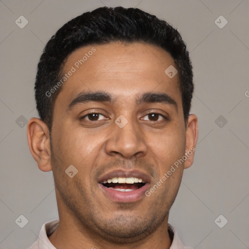 Joyful black young-adult male with short  black hair and brown eyes