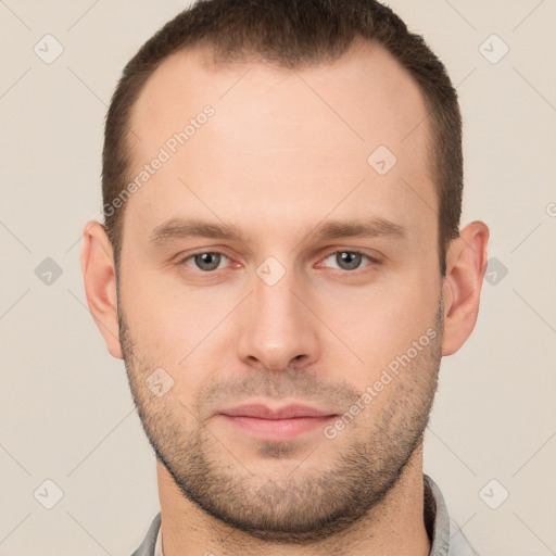 Neutral white young-adult male with short  brown hair and brown eyes