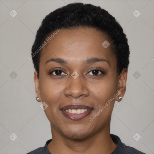 Joyful black young-adult female with short  black hair and brown eyes