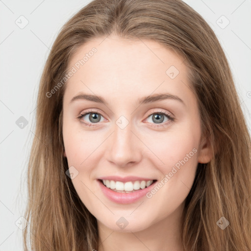 Joyful white young-adult female with long  brown hair and green eyes