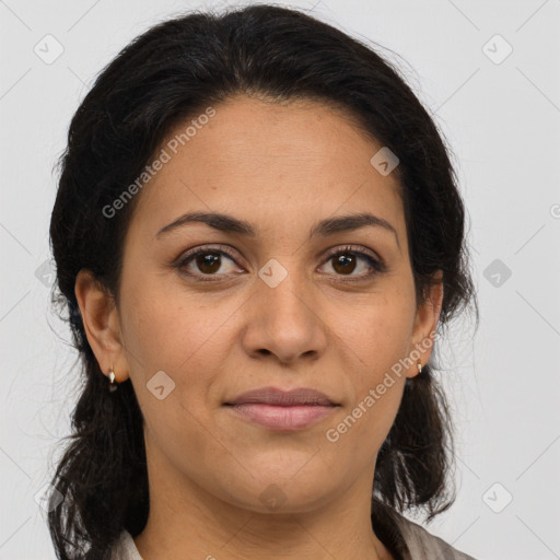 Joyful latino young-adult female with medium  brown hair and brown eyes