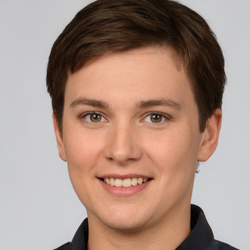 Joyful white young-adult female with short  brown hair and grey eyes