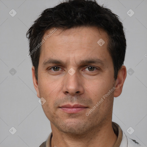 Neutral white adult male with short  black hair and brown eyes