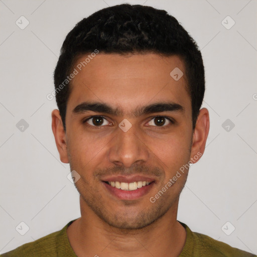 Joyful latino young-adult male with short  black hair and brown eyes