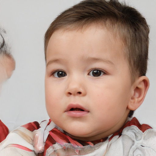 Neutral white child male with short  brown hair and brown eyes