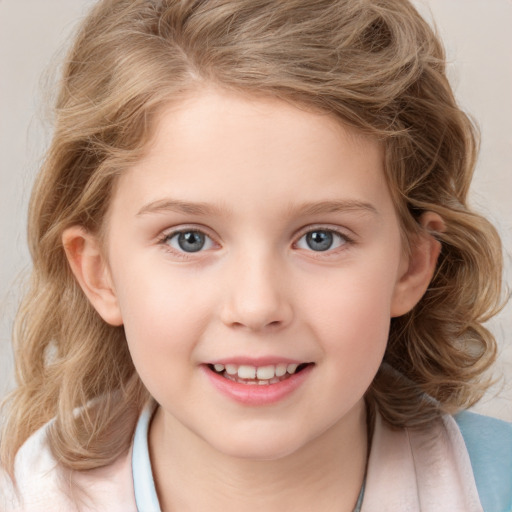 Joyful white child female with medium  brown hair and blue eyes