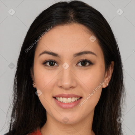 Joyful asian young-adult female with long  brown hair and brown eyes