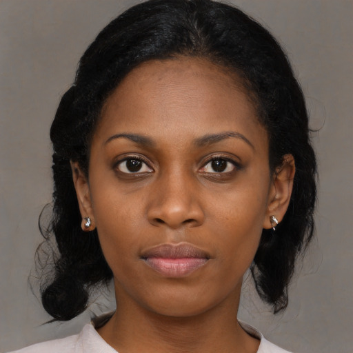 Neutral black young-adult female with medium  black hair and brown eyes