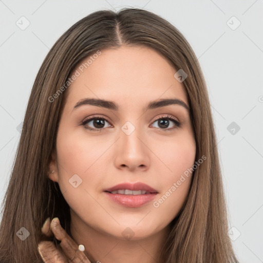 Neutral white young-adult female with long  brown hair and brown eyes