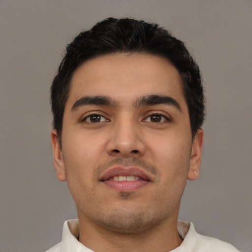 Neutral latino young-adult male with short  black hair and brown eyes