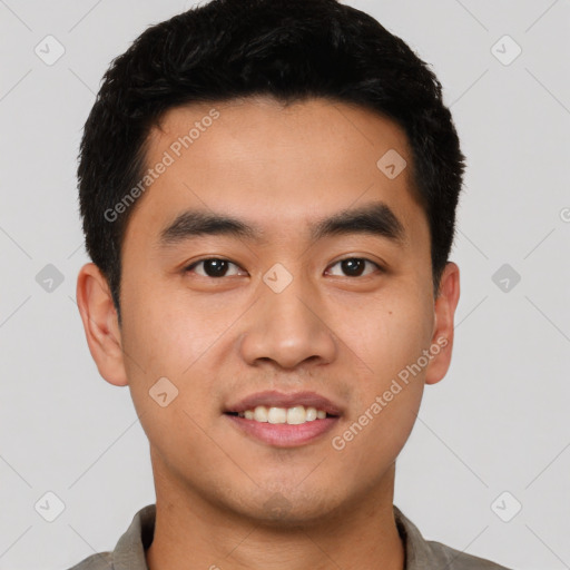 Joyful white young-adult male with short  black hair and brown eyes