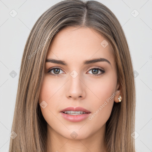 Neutral white young-adult female with long  brown hair and brown eyes