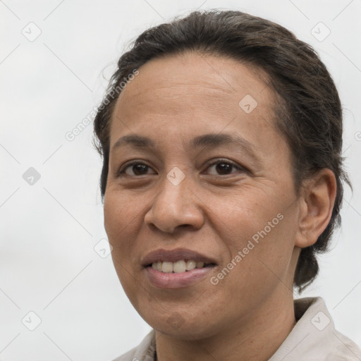 Joyful white adult female with short  brown hair and brown eyes