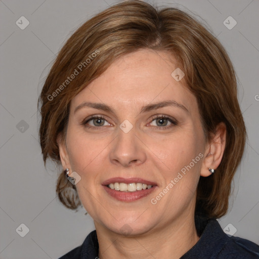 Joyful white adult female with medium  brown hair and grey eyes