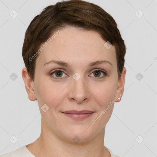 Joyful white young-adult female with short  brown hair and grey eyes