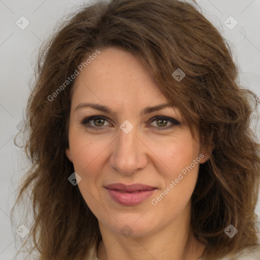 Joyful white adult female with long  brown hair and brown eyes