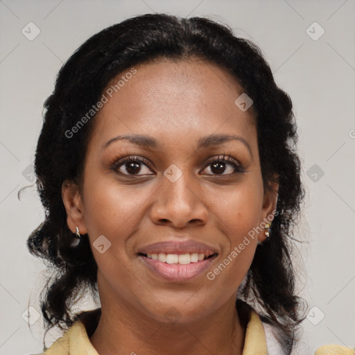 Joyful black young-adult female with medium  brown hair and brown eyes