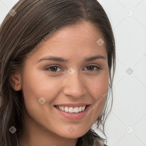 Joyful white young-adult female with long  brown hair and brown eyes