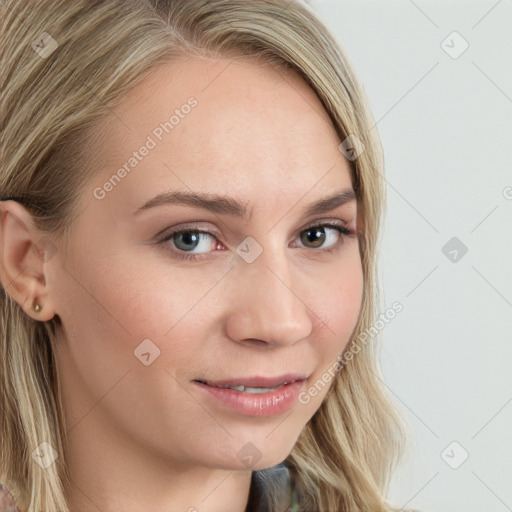 Joyful white young-adult female with long  brown hair and blue eyes