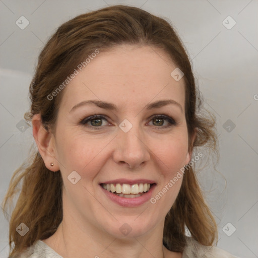 Joyful white young-adult female with medium  brown hair and green eyes