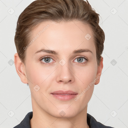 Joyful white young-adult female with short  brown hair and grey eyes