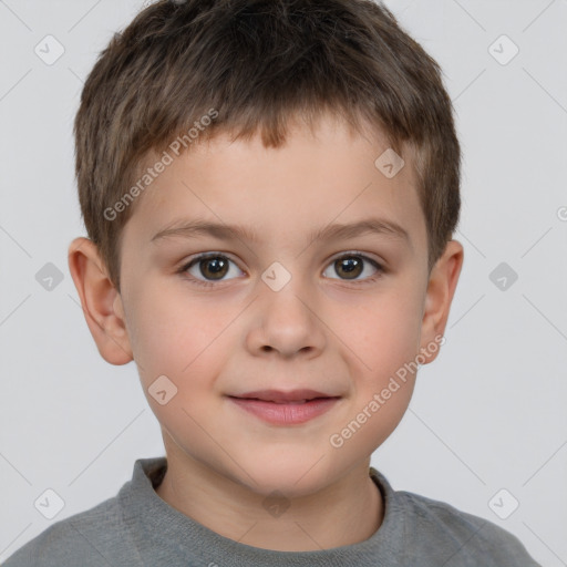 Joyful white child male with short  brown hair and brown eyes