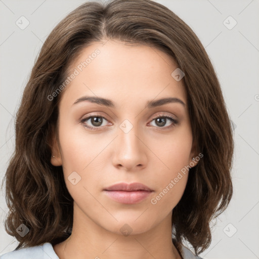 Neutral white young-adult female with medium  brown hair and brown eyes