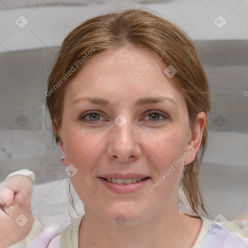 Joyful white young-adult female with medium  brown hair and blue eyes