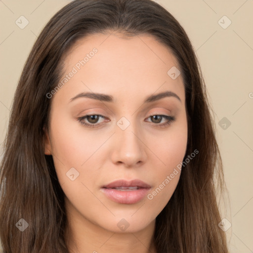 Neutral white young-adult female with long  brown hair and brown eyes