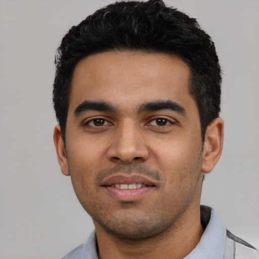 Neutral latino young-adult male with short  black hair and brown eyes