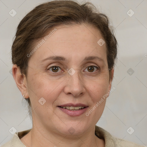 Joyful white adult female with short  brown hair and grey eyes