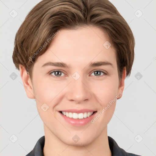 Joyful white young-adult female with short  brown hair and grey eyes