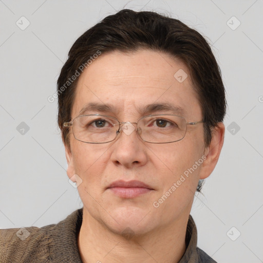 Joyful white adult male with short  brown hair and grey eyes