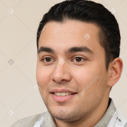 Joyful white young-adult male with short  black hair and brown eyes