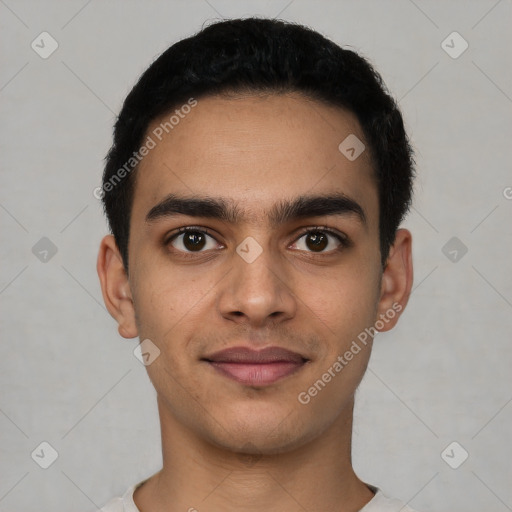 Joyful latino young-adult male with short  black hair and brown eyes