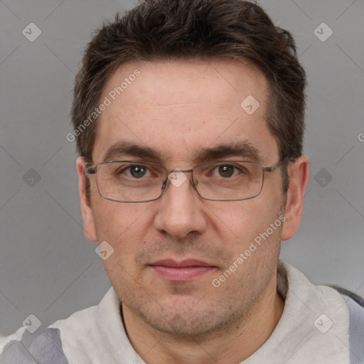 Joyful white adult male with short  brown hair and grey eyes