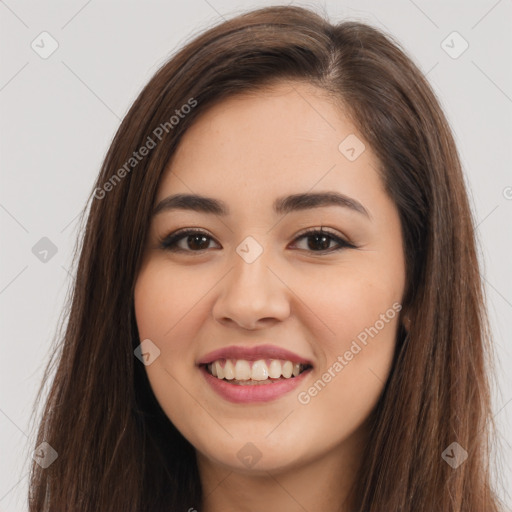 Joyful white young-adult female with long  brown hair and brown eyes