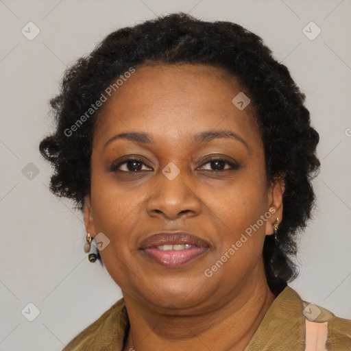 Joyful black adult female with medium  brown hair and brown eyes