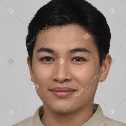 Joyful asian young-adult male with short  black hair and brown eyes