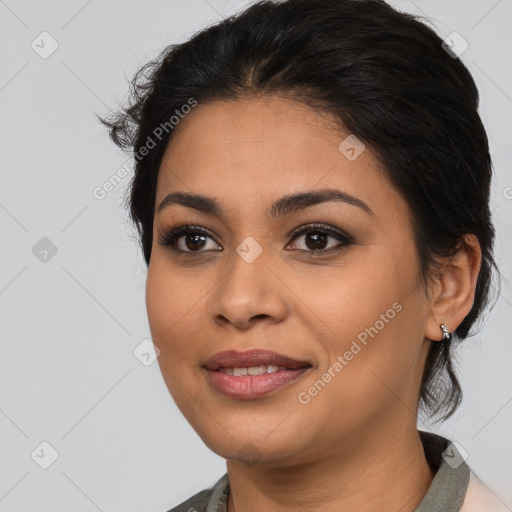 Joyful latino young-adult female with medium  brown hair and brown eyes