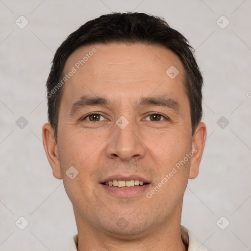 Joyful white adult male with short  brown hair and brown eyes