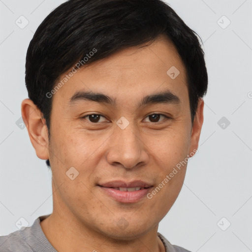 Joyful latino young-adult male with short  brown hair and brown eyes