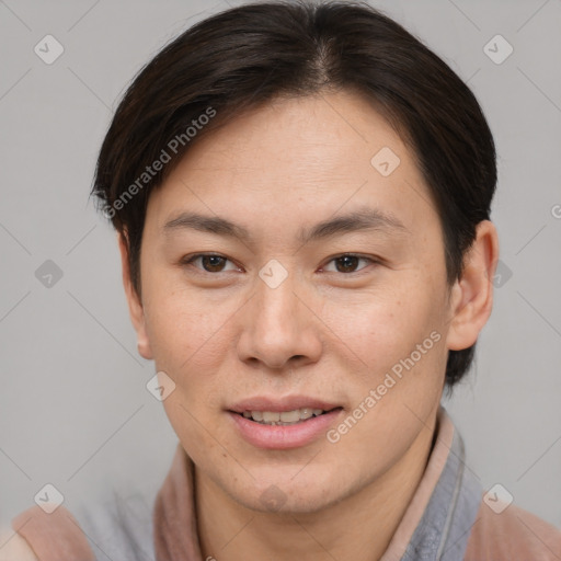 Joyful asian young-adult female with short  brown hair and brown eyes